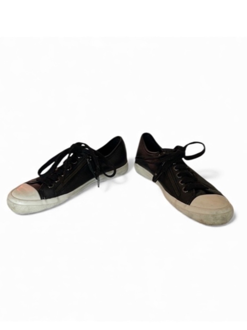 Coach women’s Black Low-Top Leather Sneakers with White Toe Cap